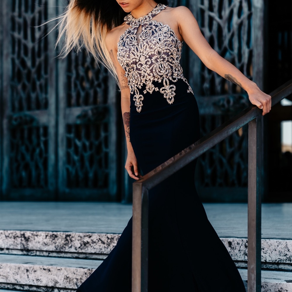 Embroidered high neck special occasion dress.